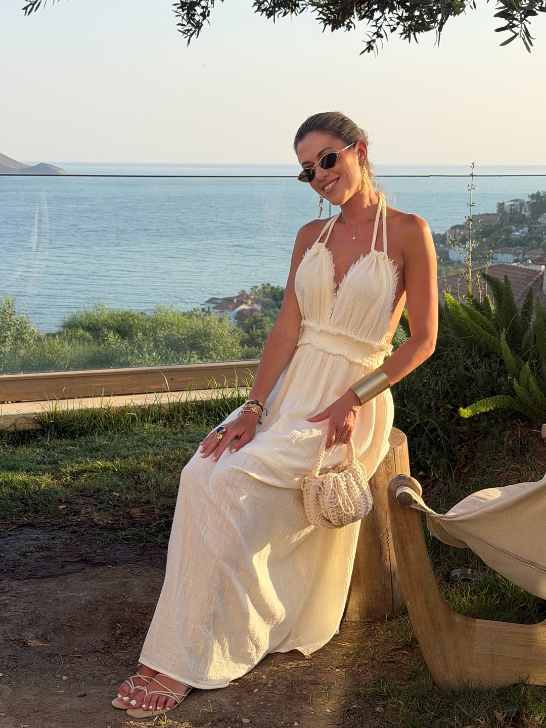 Effortless beige linen maxi dress with halter neckline, perf